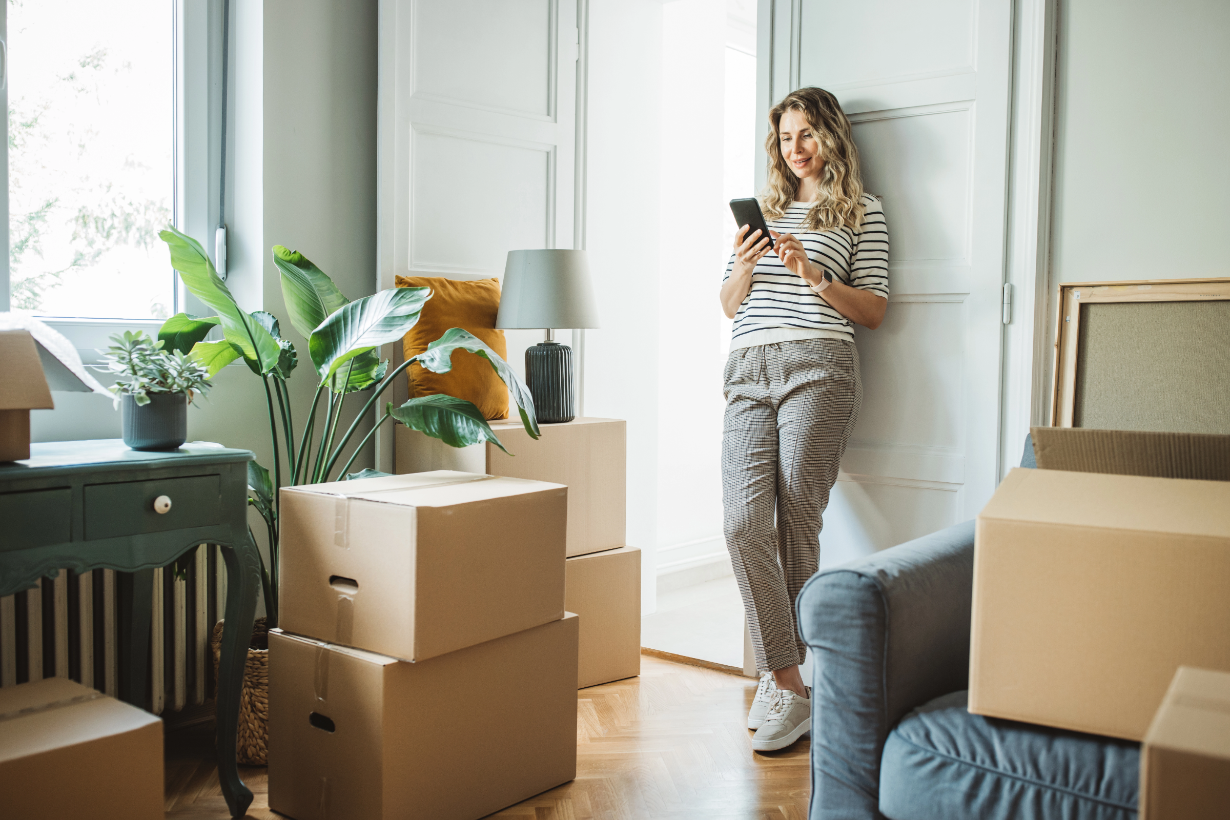 woman moving into new home - irish mortgages - doddl
