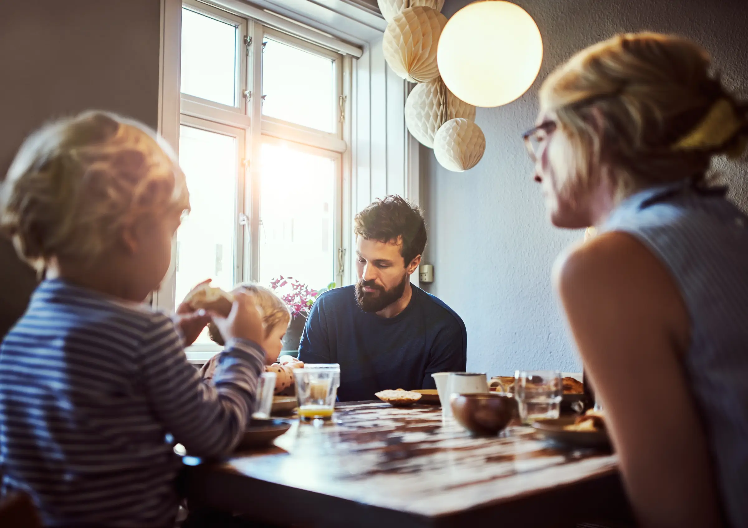 family having breakfast in new home - switch mortgage - doddl